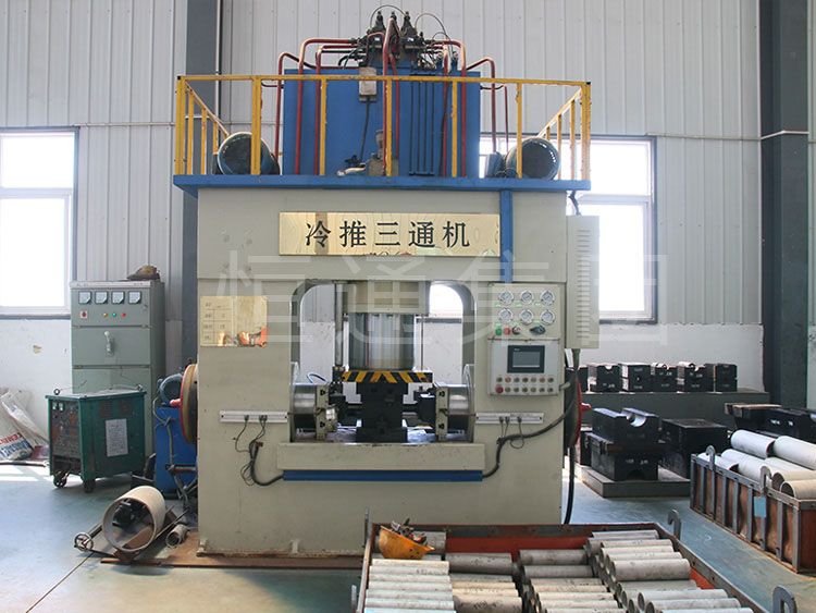 Cold-Push Tee Machine